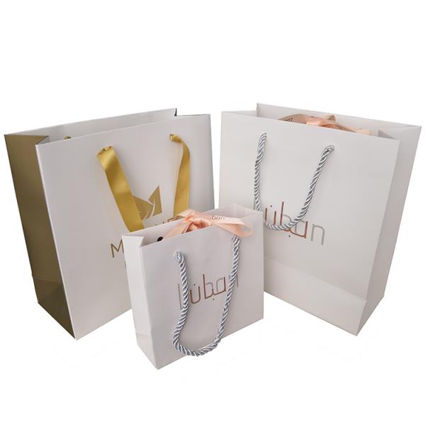 Custom printed white shopping paper bag Custom printed white shopping paper bag