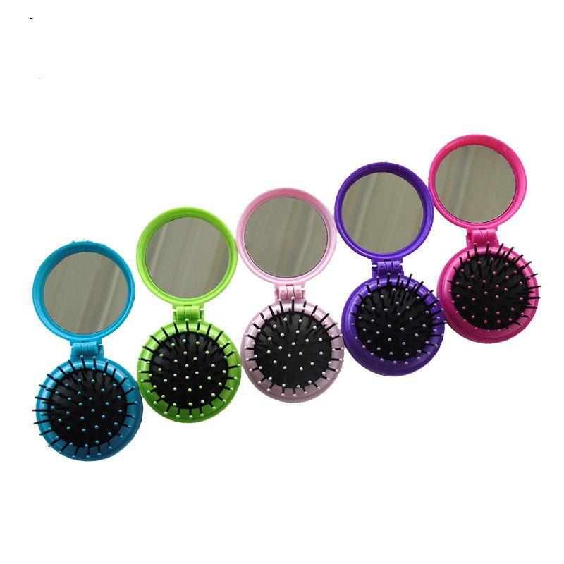 Portable round folding airbag massage plastic comb with makeup mirror Portable round folding airbag massage plastic comb with makeup mirror